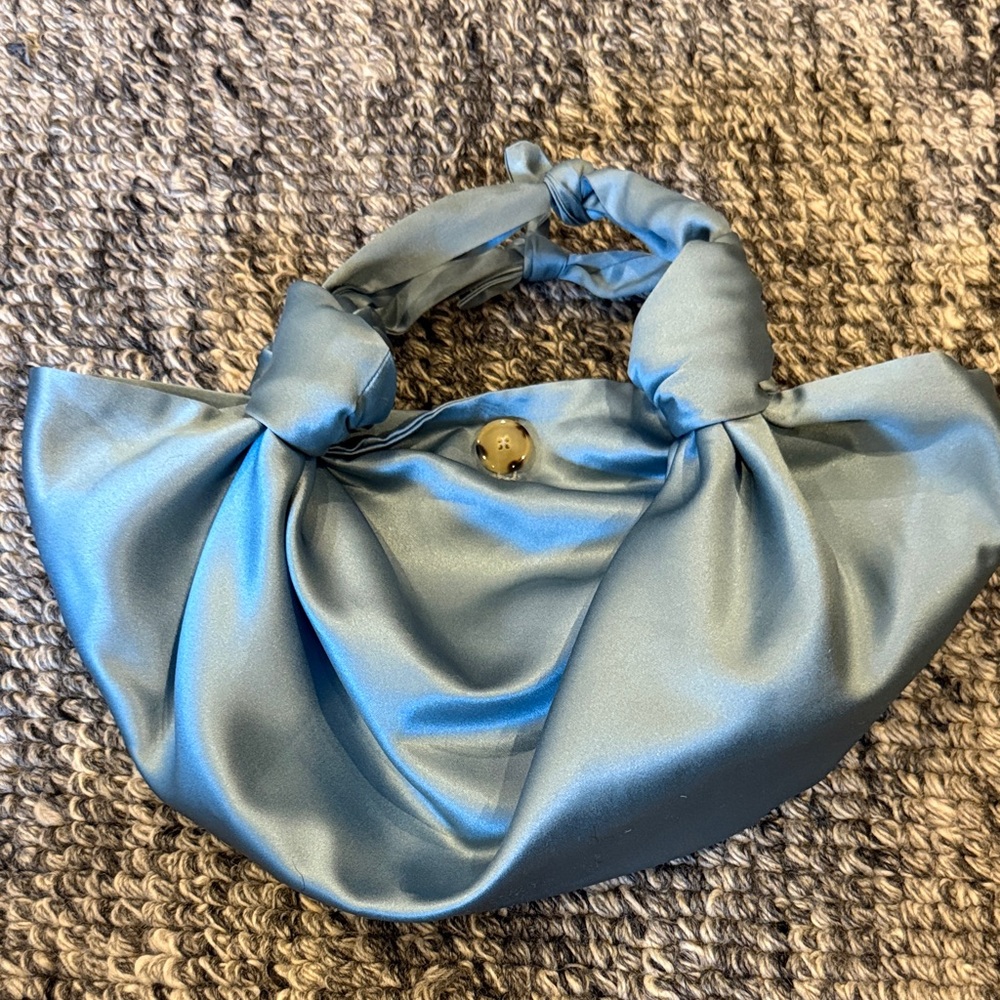 Satin bag with knot detail
